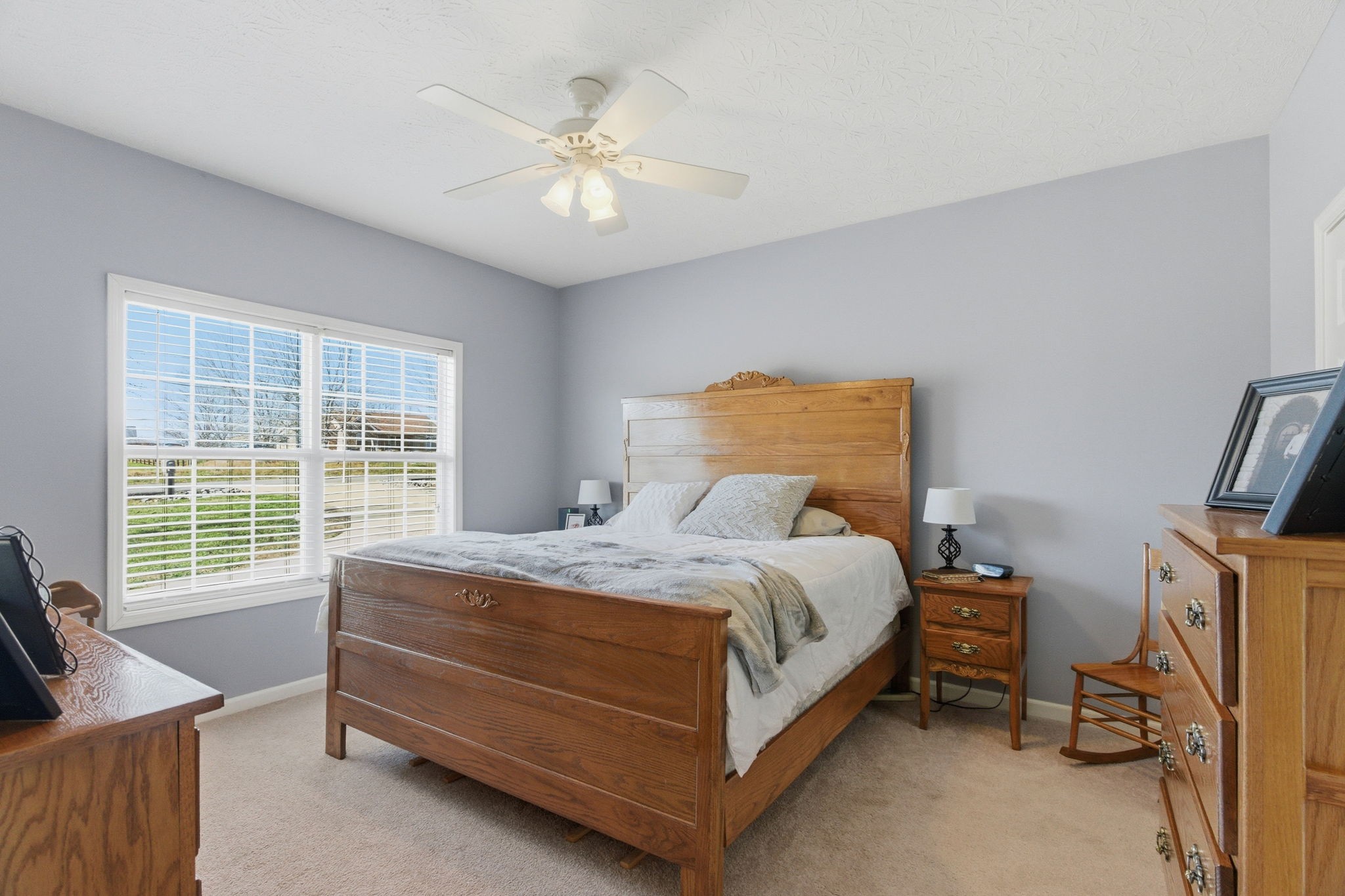 4357 Airport Road Springfield, TN 37172 - Photo 11 of 49 a bedroom with a bed and a chandelier