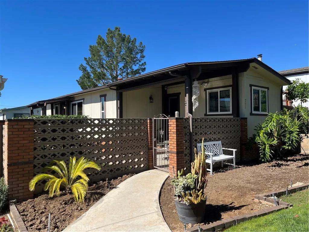 751 Village Lake Brea, CA 92821 - Photo 1 of 1 a front view of a house with garden