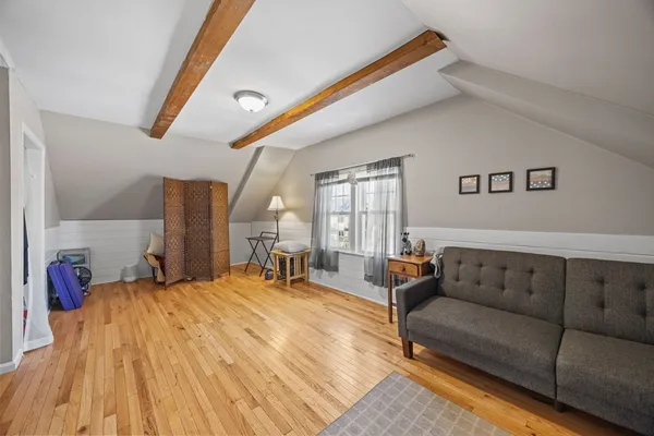 a bedroom with furniture and a couch