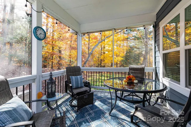 a view of a porch with furniture