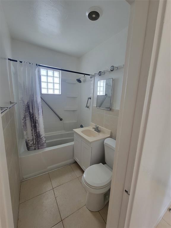 1824 Johnson Street Hollywood, FL 33020 - Photo 8 of 13 a bathroom with a toilet a sink and bathtub