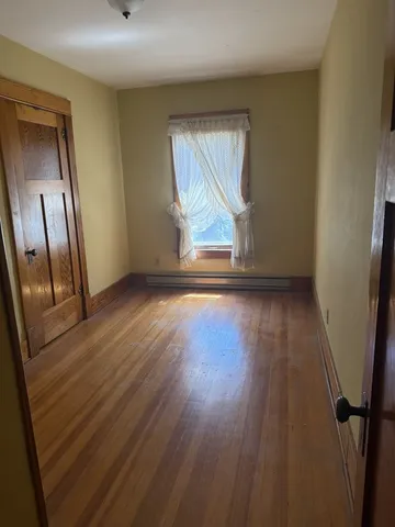 a room with furniture and window
