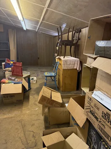 a bed room with furniture and a window