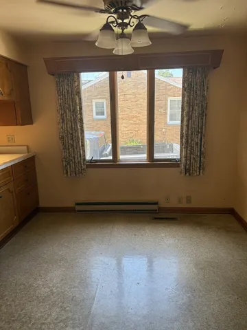 a view of entryway with stairs and wooden floor