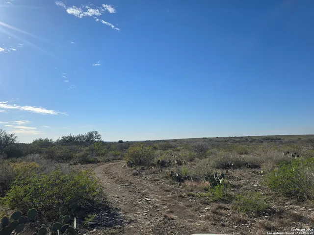 a view of a terrace with a yard