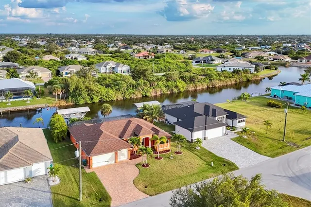 an aerial view of a house with a garden