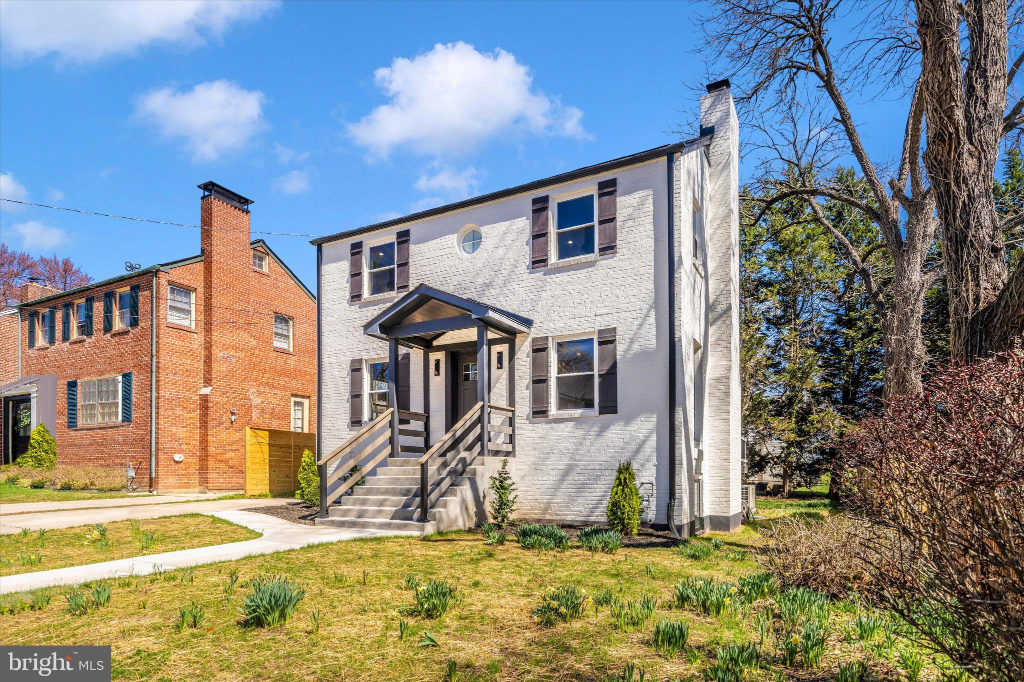 10405 Inwood Avenue Silver Spring, MD 20902 - Photo 36 of 52 a front view of a house with a yard