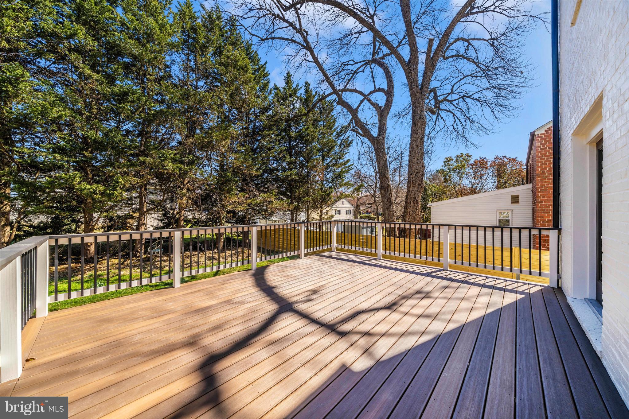 10405 Inwood Avenue Silver Spring, MD 20902 - Photo 41 of 52 a view of balcony with wooden floor and fence
