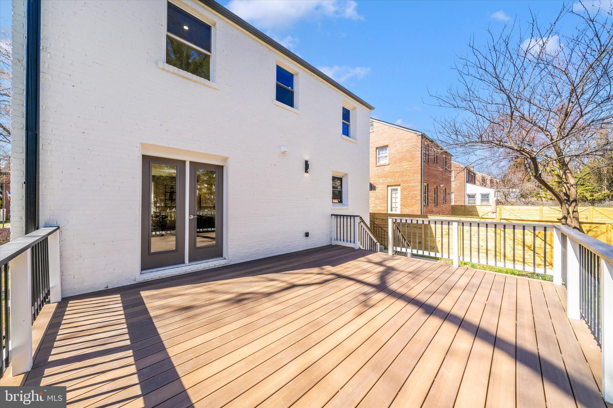10405 Inwood Avenue Silver Spring, MD 20902 - Photo 43 of 52 a view of wooden balcony with wooden floor and fence