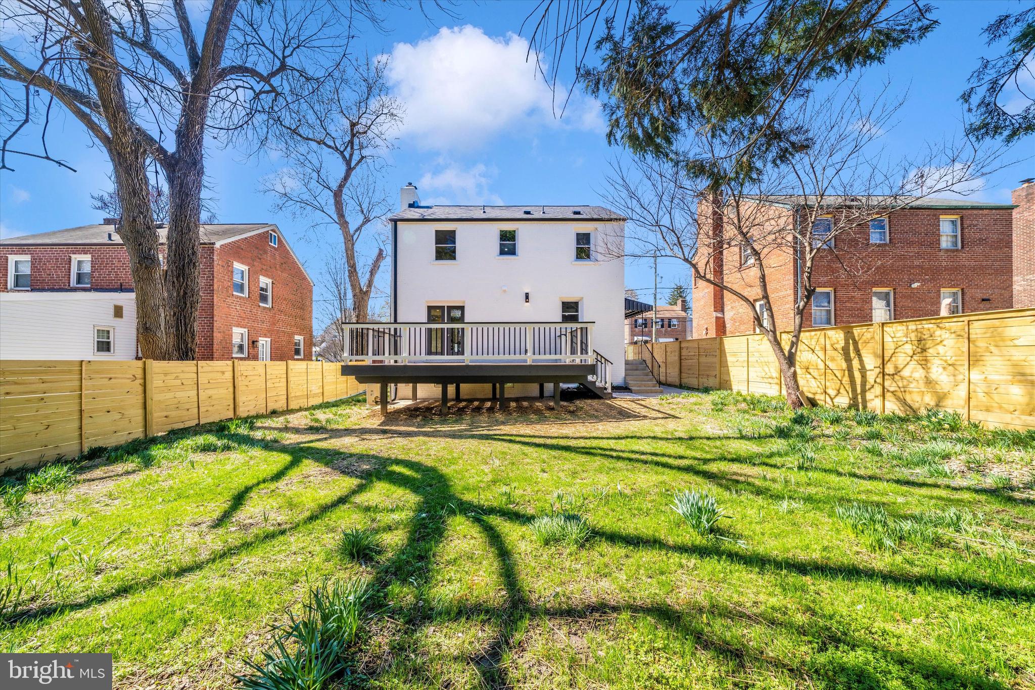 10405 Inwood Avenue Silver Spring, MD 20902 - Photo 49 of 52 a view of a house with a yard patio and fire pit