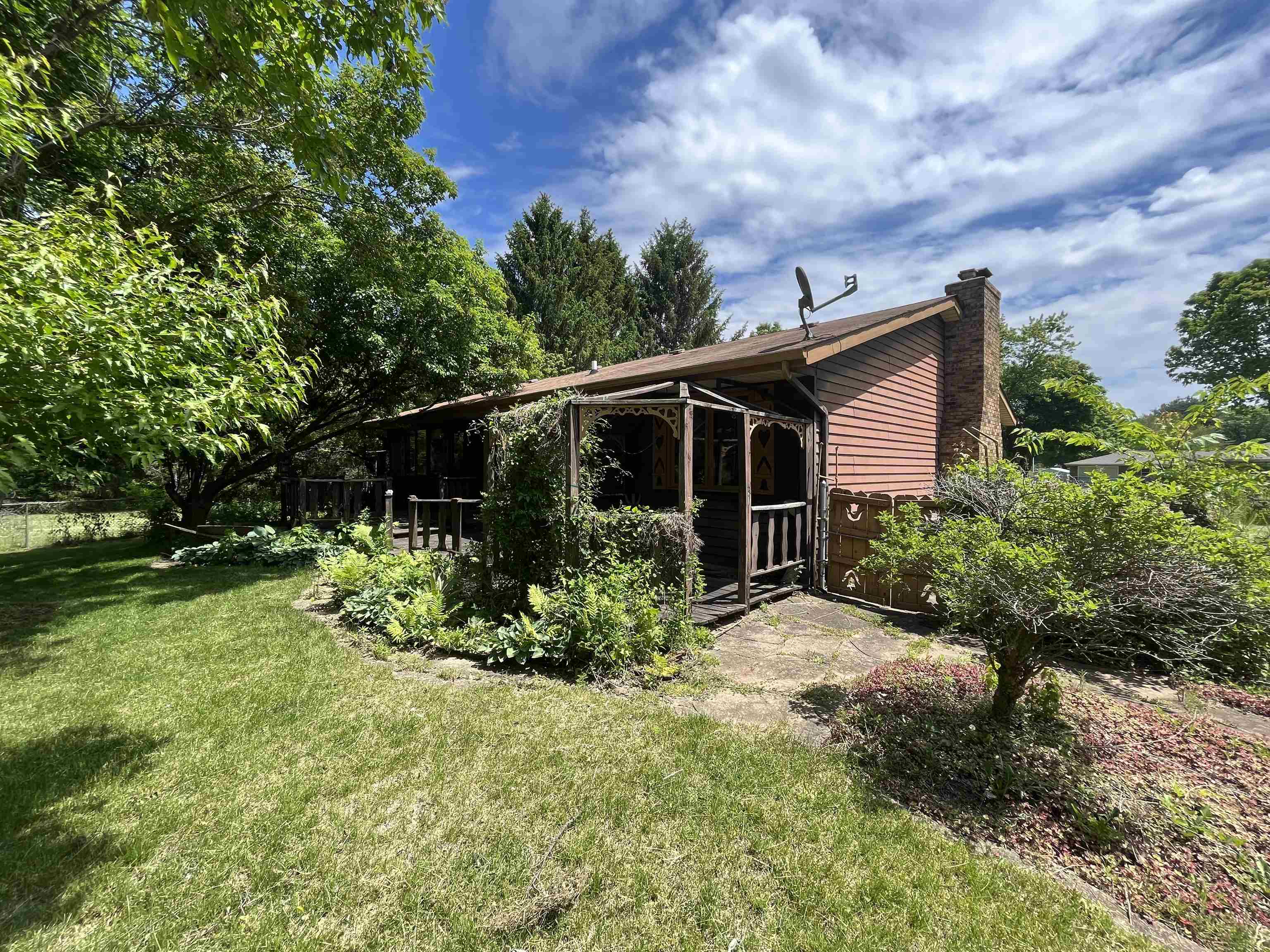 6816 Stardust Trail Roscoe, IL 61073 - Photo 18 of 21 a backyard of a house with lots of green space