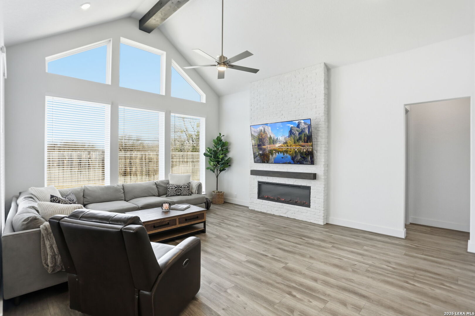 405 Corwin Cibolo, TX 78108 - Photo 11 of 46 a living room with furniture and a fireplace