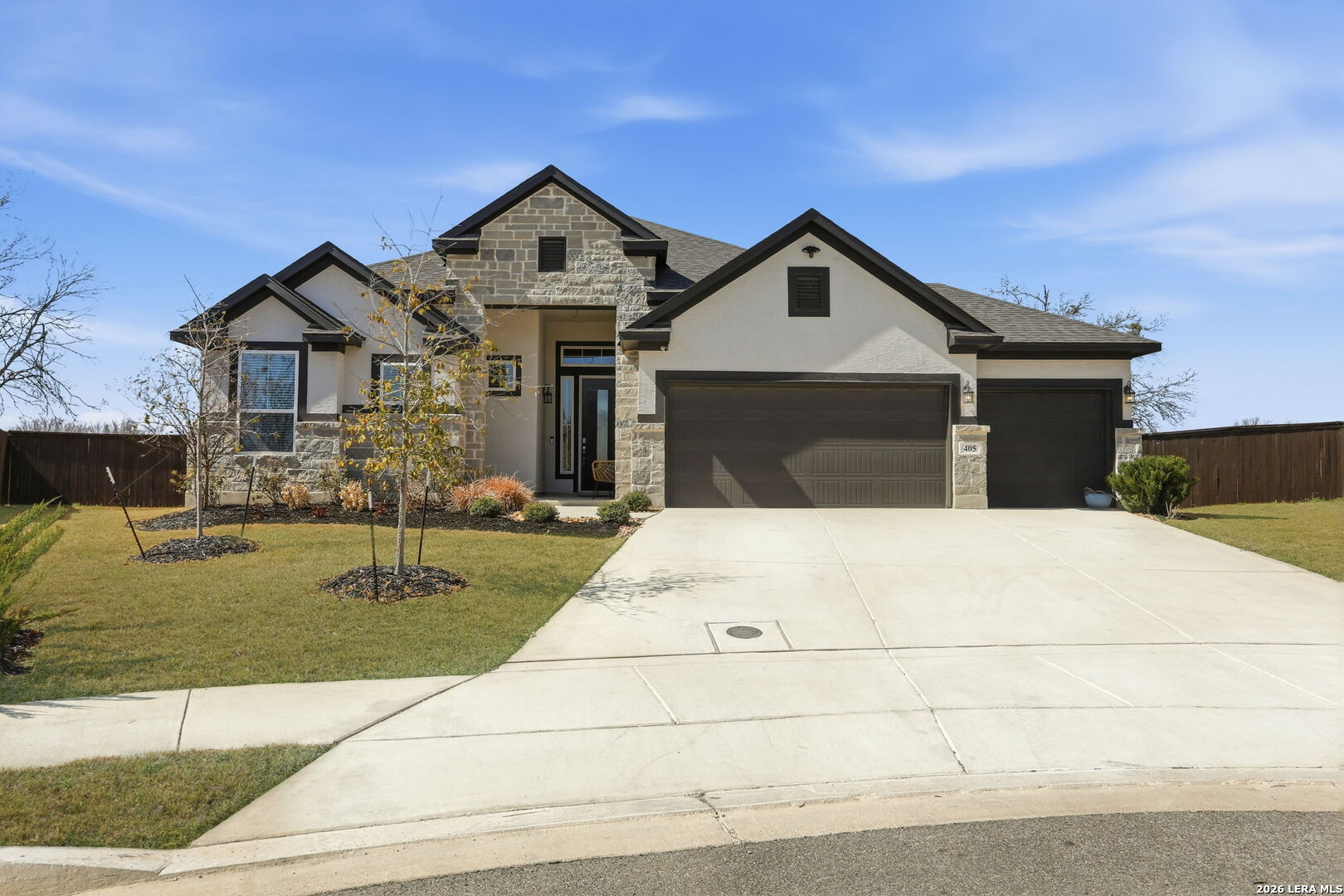 405 Corwin Cibolo, TX 78108 - Photo 2 of 46 a front view of a house with garden