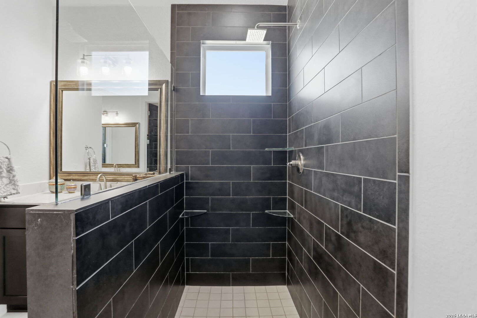 405 Corwin Cibolo, TX 78108 - Photo 25 of 46 a bathroom with a sink and a mirror