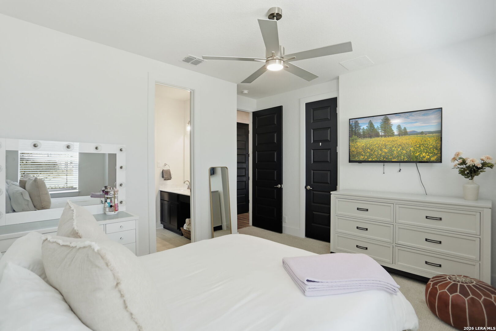 405 Corwin Cibolo, TX 78108 - Photo 30 of 46 a bedroom with a bed and a flat screen tv