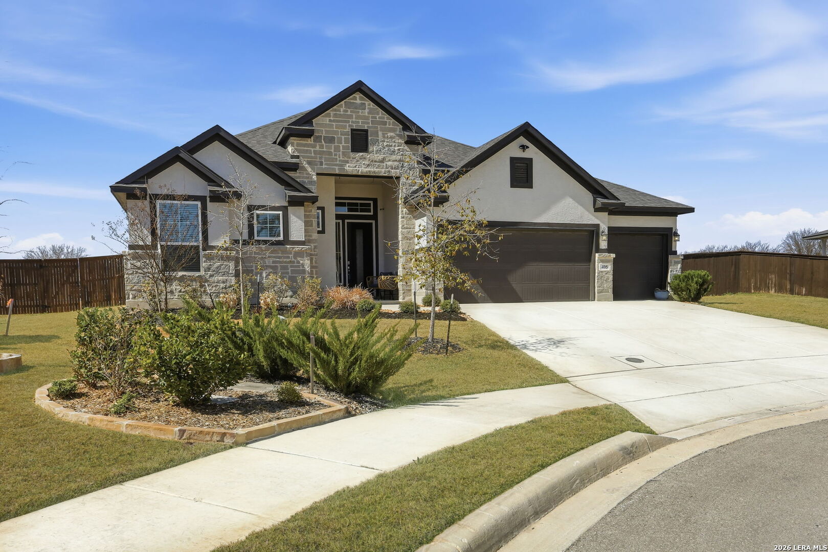 405 Corwin Cibolo, TX 78108 - Photo 3 of 46 a front view of a house with a yard