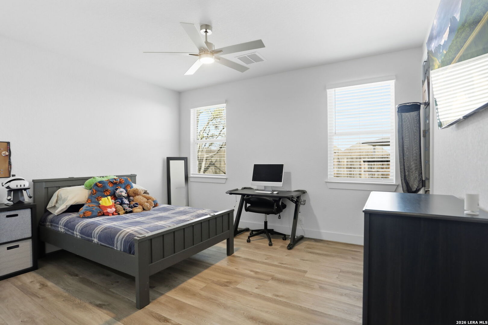 405 Corwin Cibolo, TX 78108 - Photo 31 of 46 a bedroom with a bed and a desk