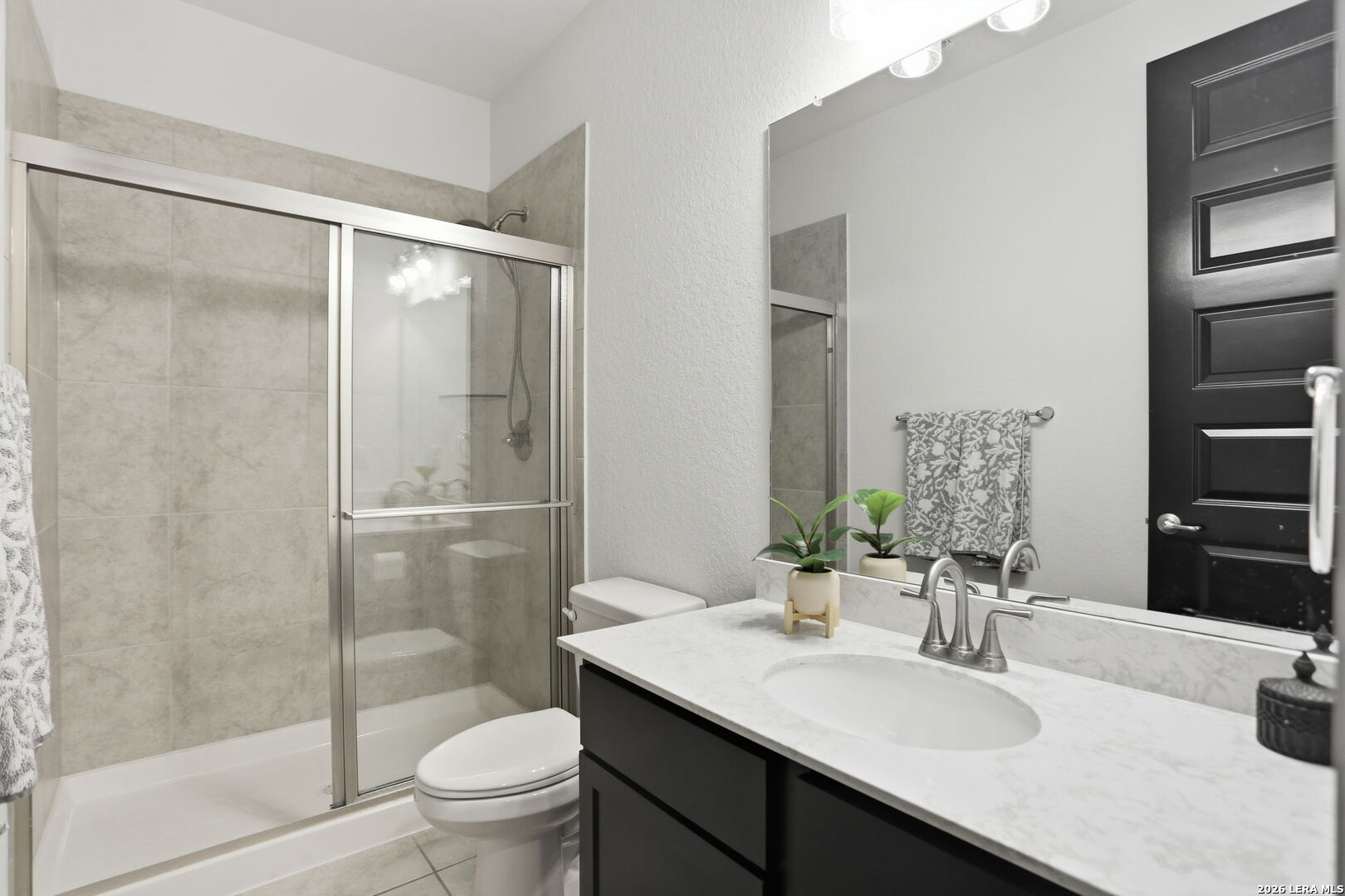 405 Corwin Cibolo, TX 78108 - Photo 32 of 46 a bathroom with a sink toilet and shower