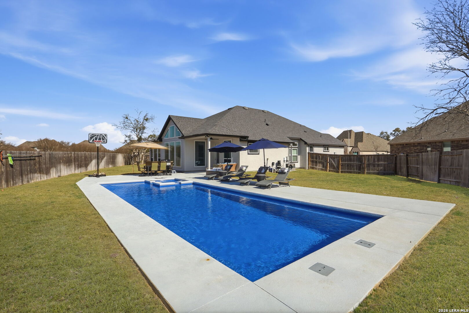405 Corwin Cibolo, TX 78108 - Photo 37 of 46 a view of a house with pool and a yard