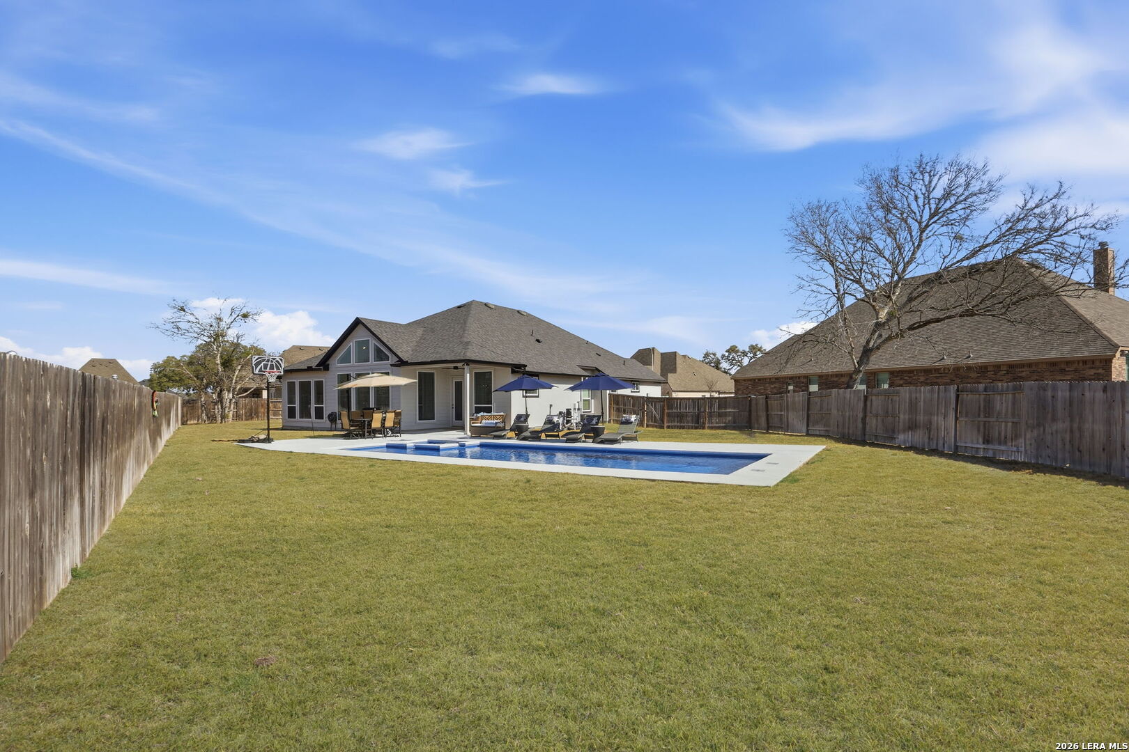 405 Corwin Cibolo, TX 78108 - Photo 39 of 46 a view of a house with pool and a yard