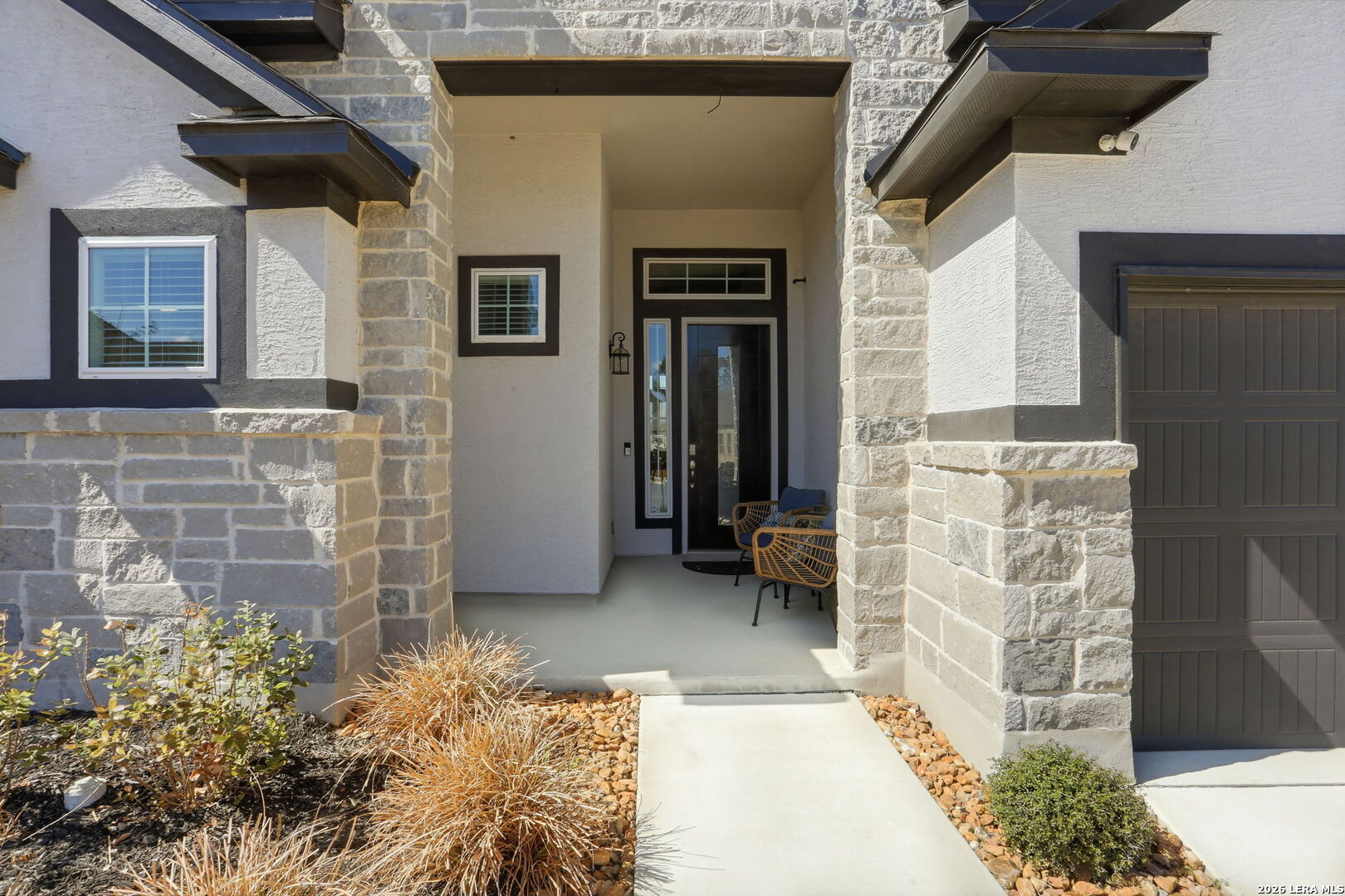 405 Corwin Cibolo, TX 78108 - Photo 4 of 46 a view of front door of house with potted plant