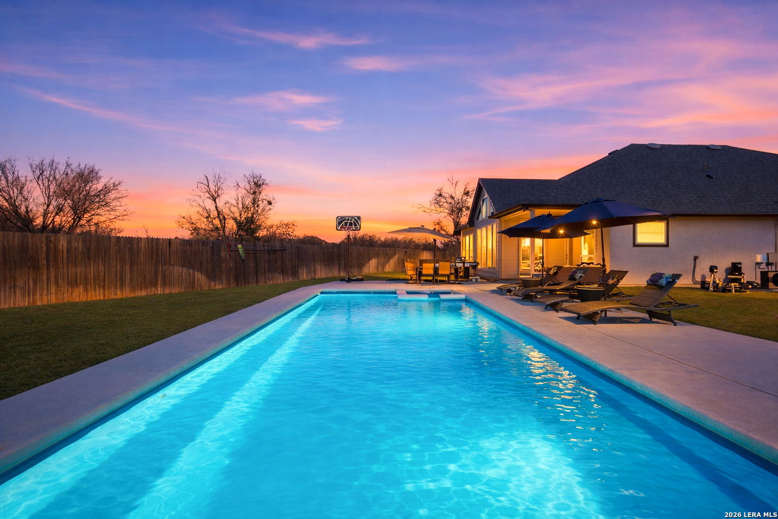 405 Corwin Cibolo, TX 78108 - Photo 42 of 46 a view of a swimming pool and lounge chairs
