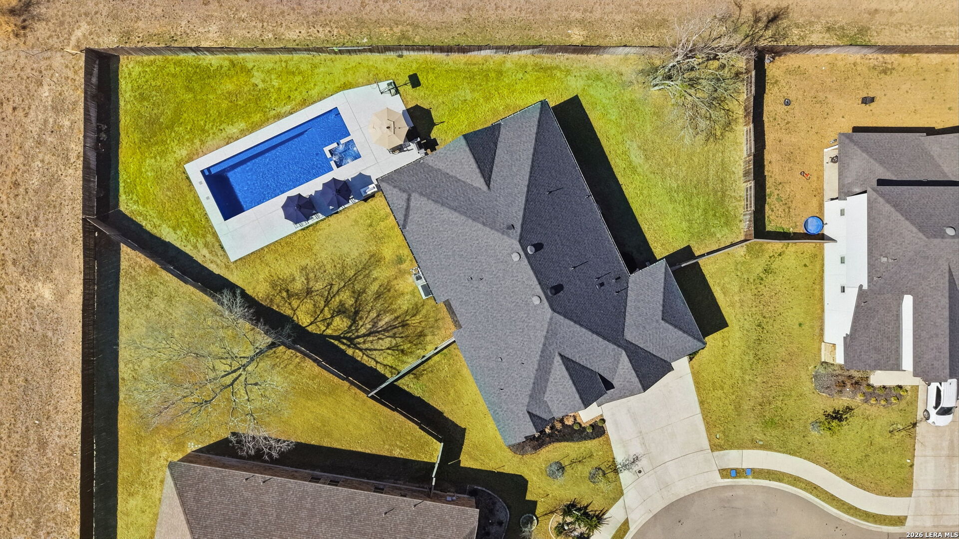 405 Corwin Cibolo, TX 78108 - Photo 44 of 46 an aerial view of a house with a swimming pool