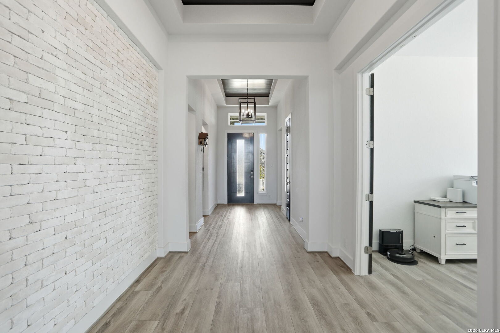 405 Corwin Cibolo, TX 78108 - Photo 5 of 46 a view of livingroom with hardwood floor and window