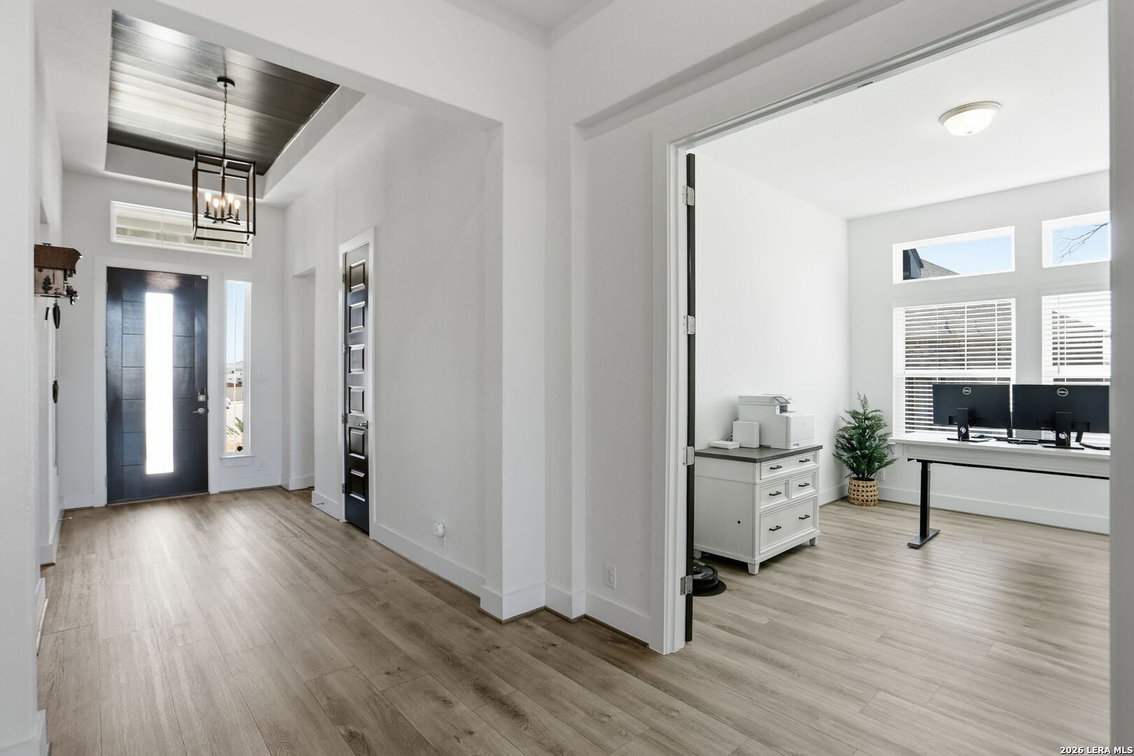 405 Corwin Cibolo, TX 78108 - Photo 6 of 46 a view of a livingroom with furniture and hardwood floor