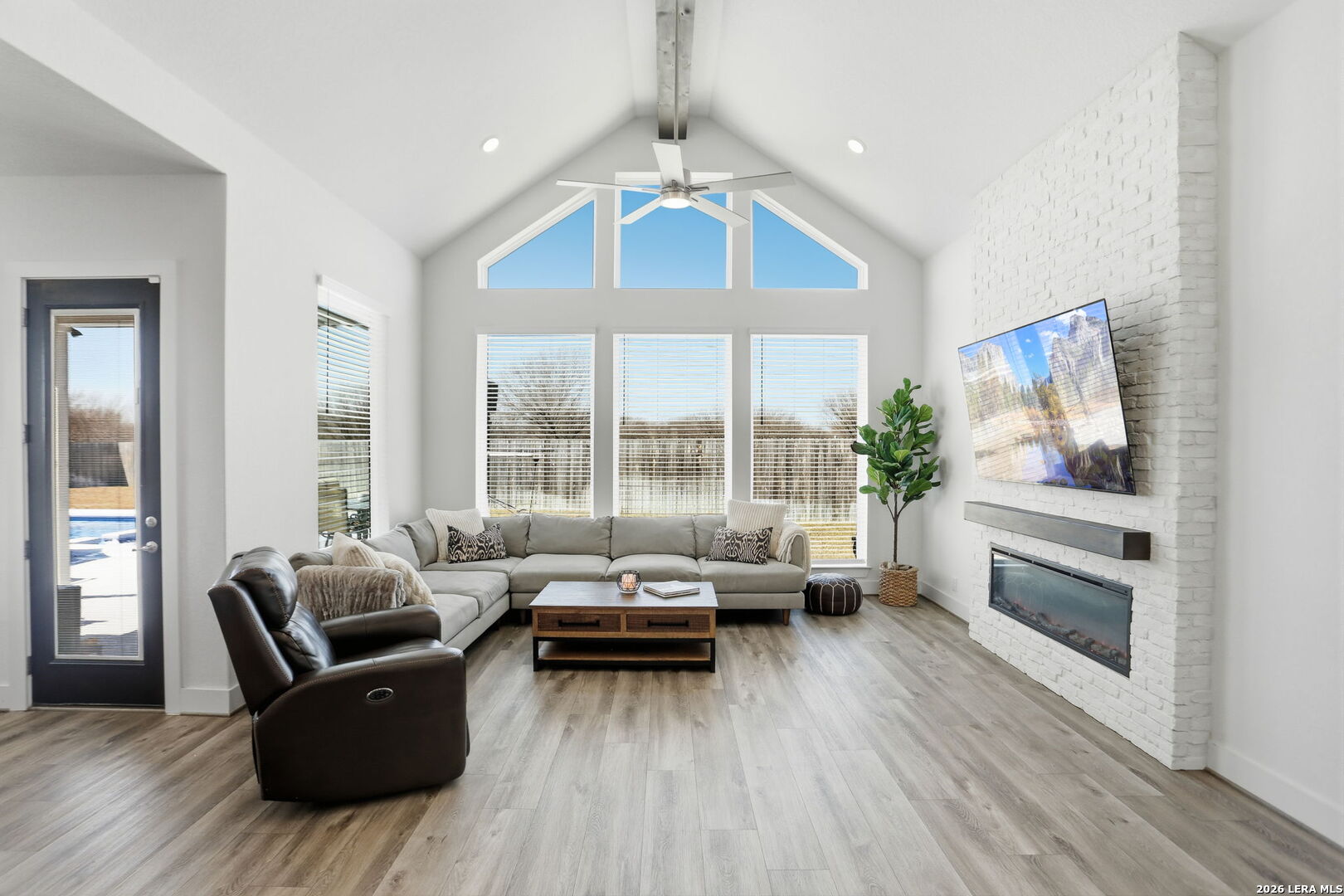 405 Corwin Cibolo, TX 78108 - Photo 10 of 46 a living room with furniture and a large window