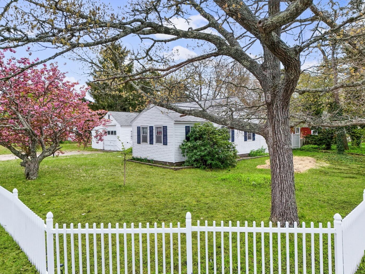1 Gilbert Road Dennis Port, MA 02639 - Photo 2 of 27 a view of a house with a yard