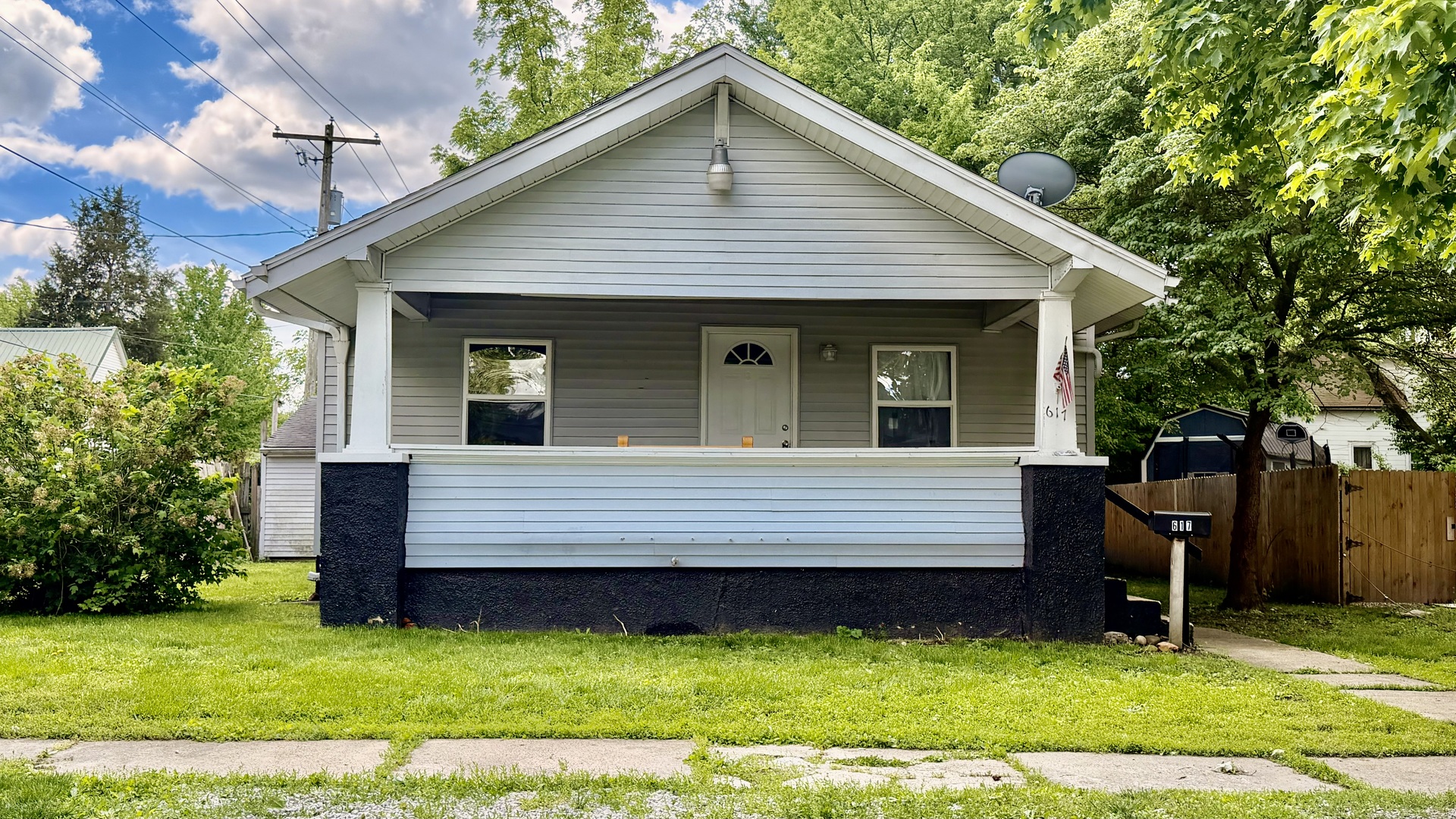 617 East 4th Street Centralia, IL 62801 - Photo 2 of 9 a front view of a house with a yard