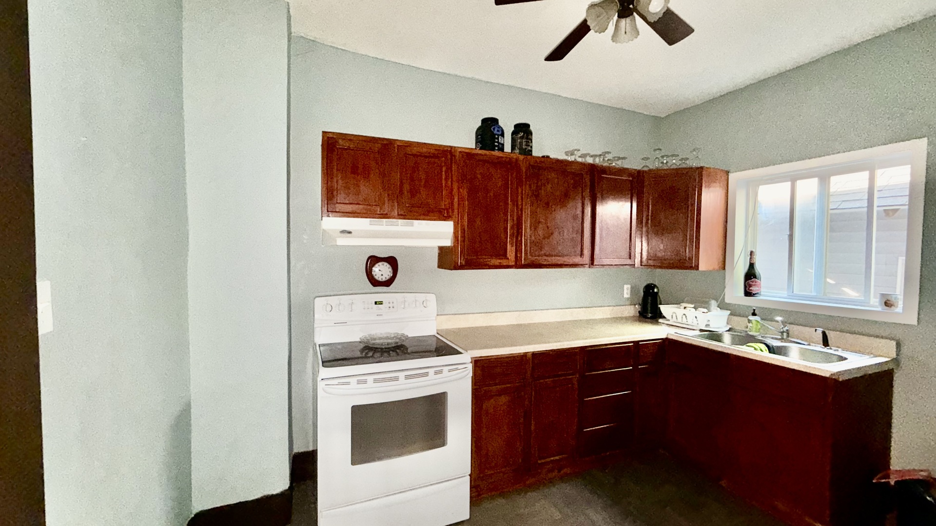 617 East 4th Street Centralia, IL 62801 - Photo 5 of 9 a kitchen with a sink cabinets and window