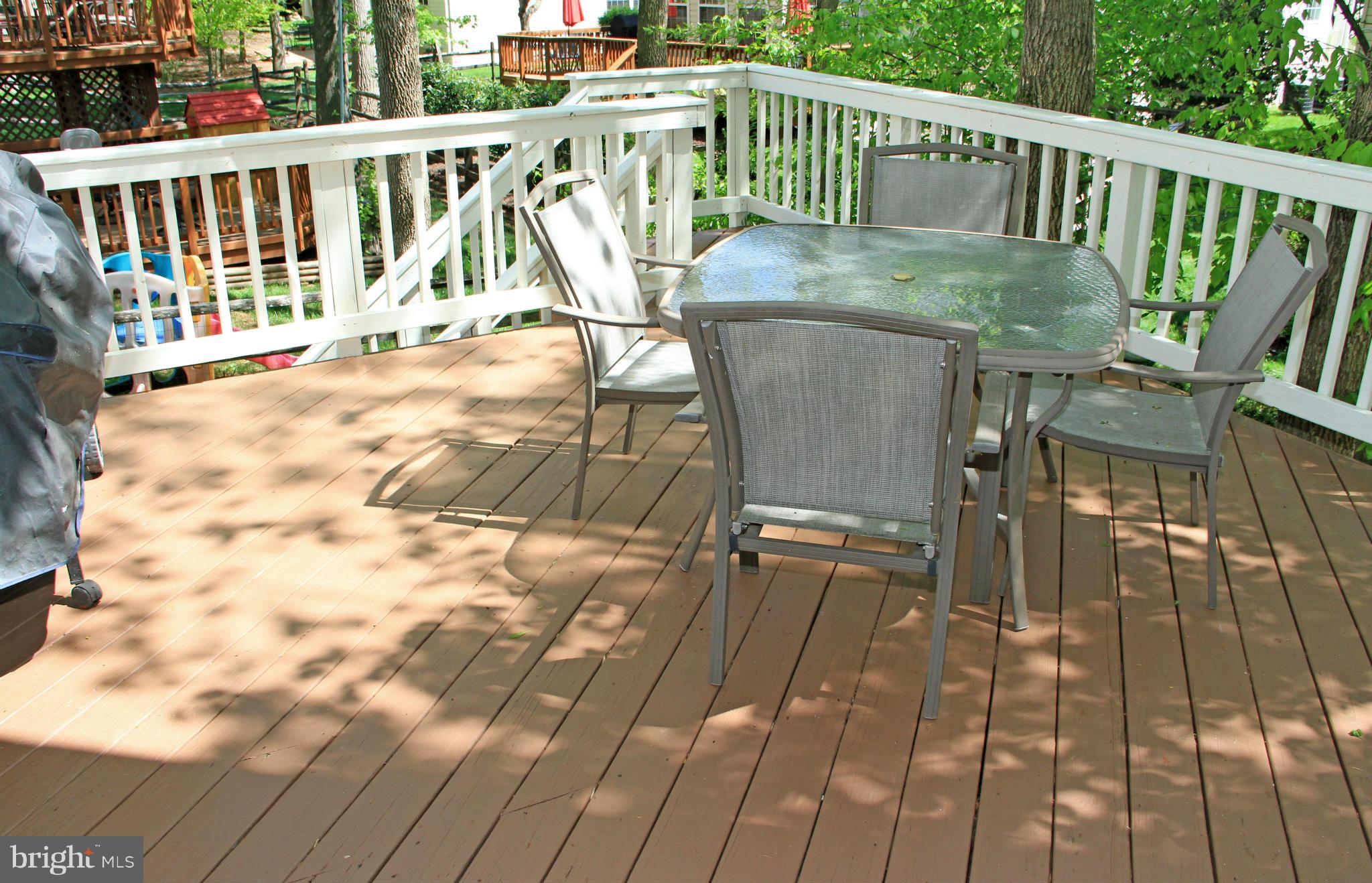 47551 Rippling Drive Sterling, VA 20165 - Photo 14 of 30 Deck off Sunroom with Stairs to Yard