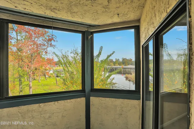 a view of a glass door with a large window