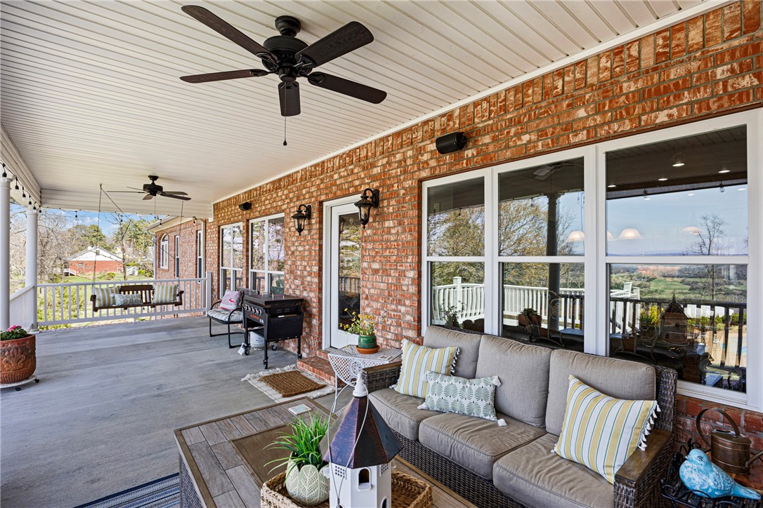 788 Cliff Road Russellville, AR 72802 - Photo 46 of 60 View of patio / terrace with outdoor furniture, ceiling fan, and grilling area