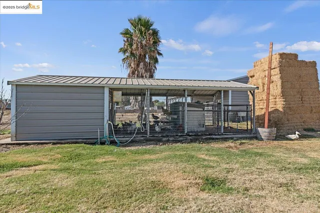 a view of a house with patio