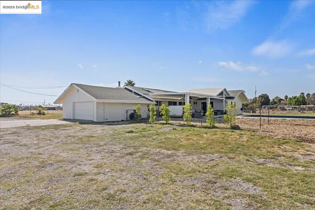 a bathroom with a sink and a yard
