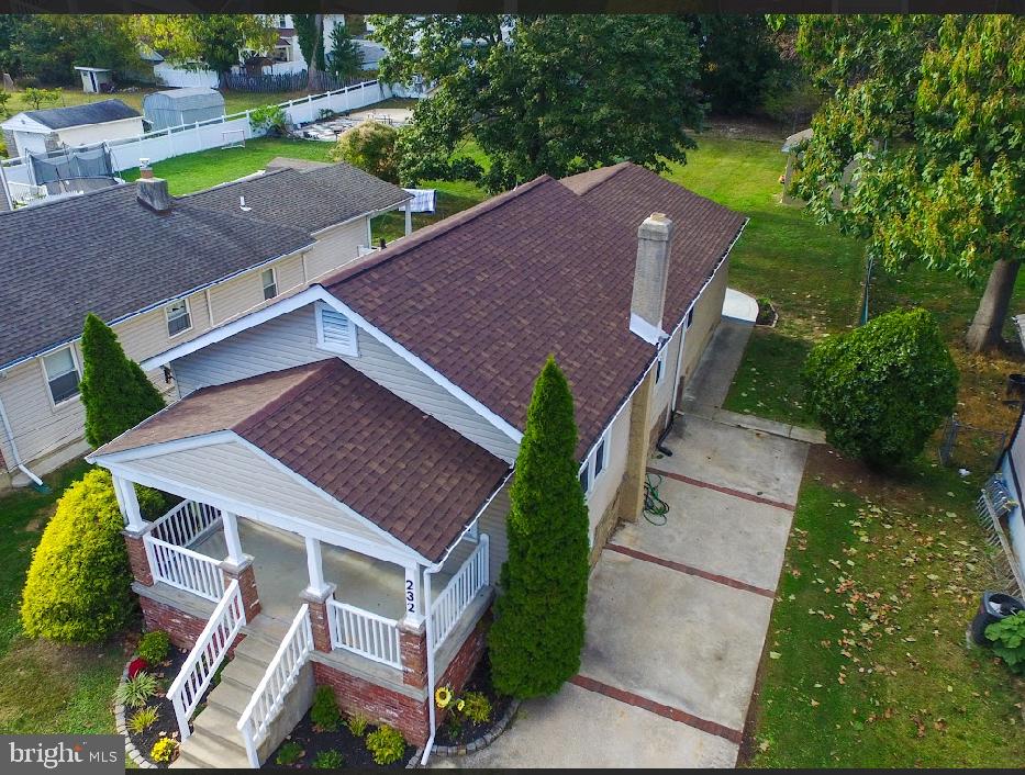 232 South Highland Road Springfield, PA 19064 - Photo 1 of 58 an aerial view of a house with a yard