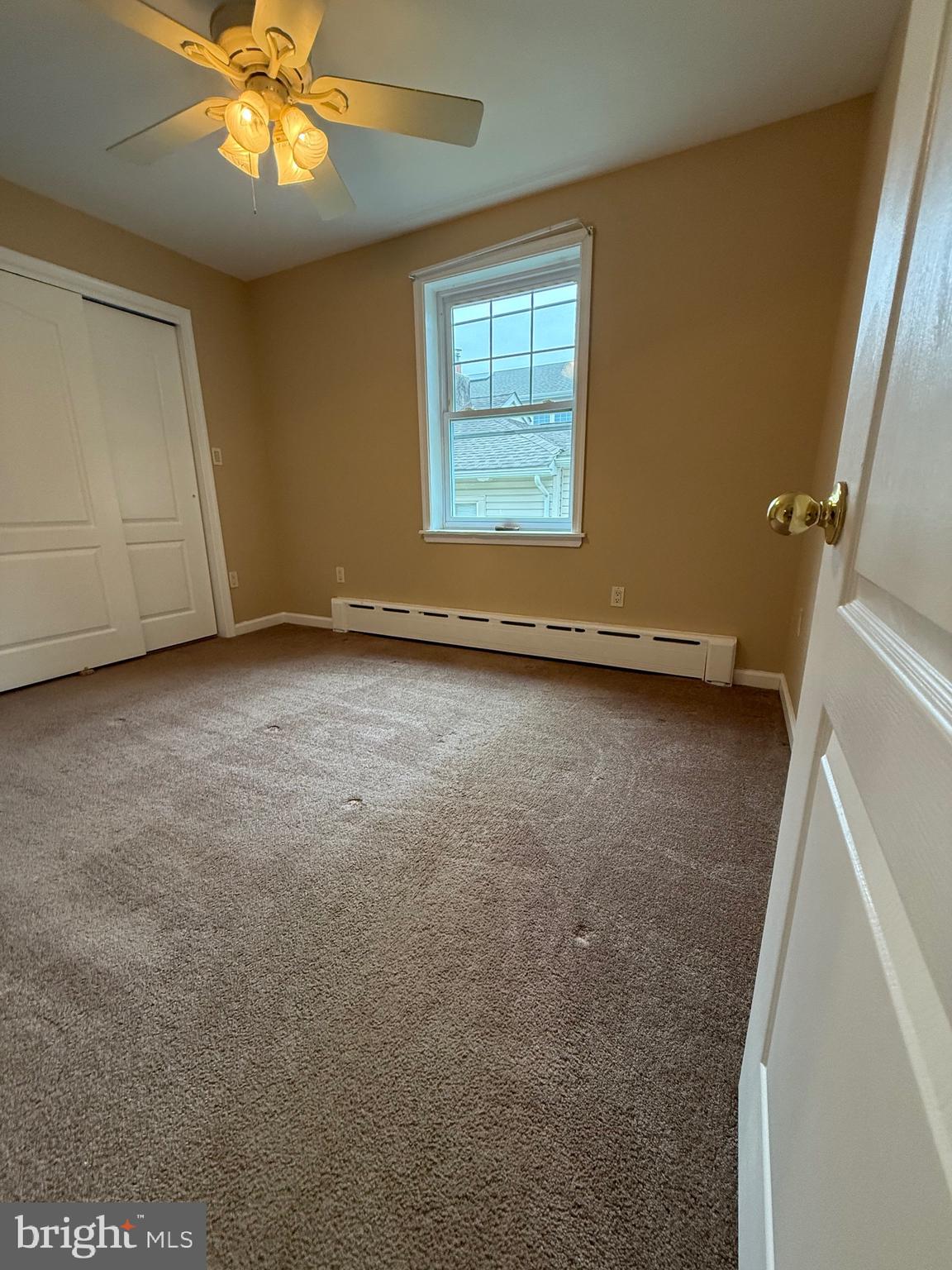 232 South Highland Road Springfield, PA 19064 - Photo 26 of 58 an empty room with a ceiling fan and a window