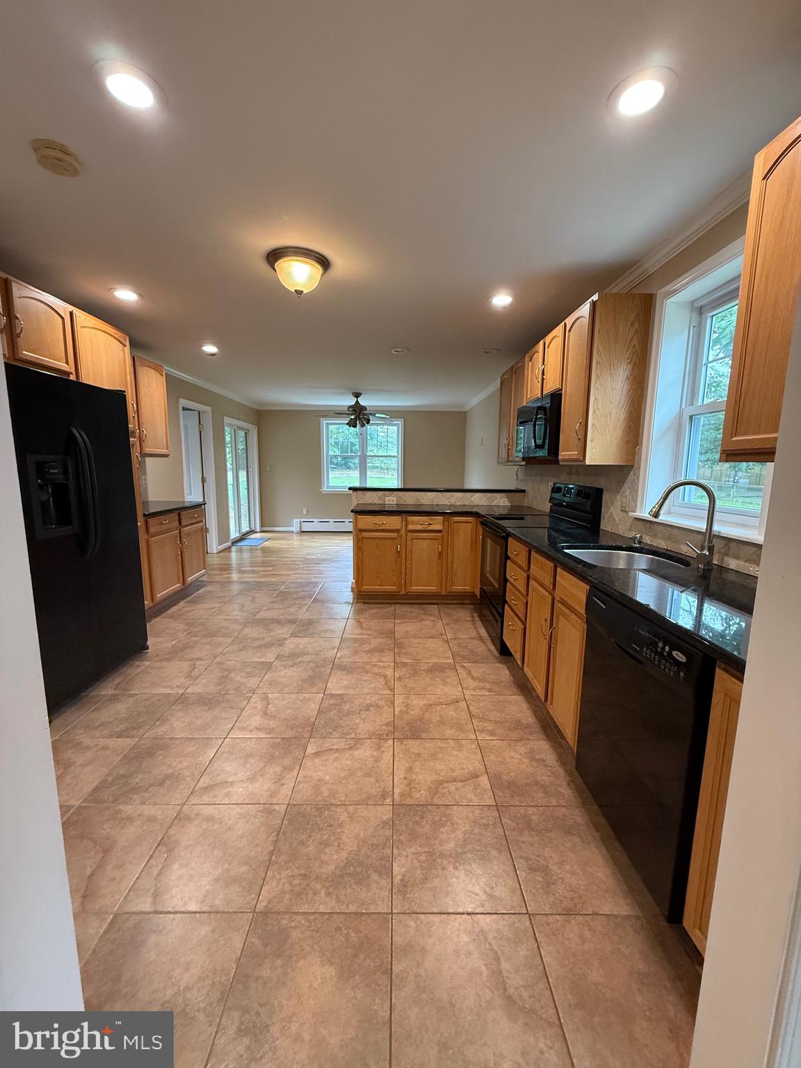 232 South Highland Road Springfield, PA 19064 - Photo 30 of 58 a large kitchen with stainless steel appliances lots of counter top space