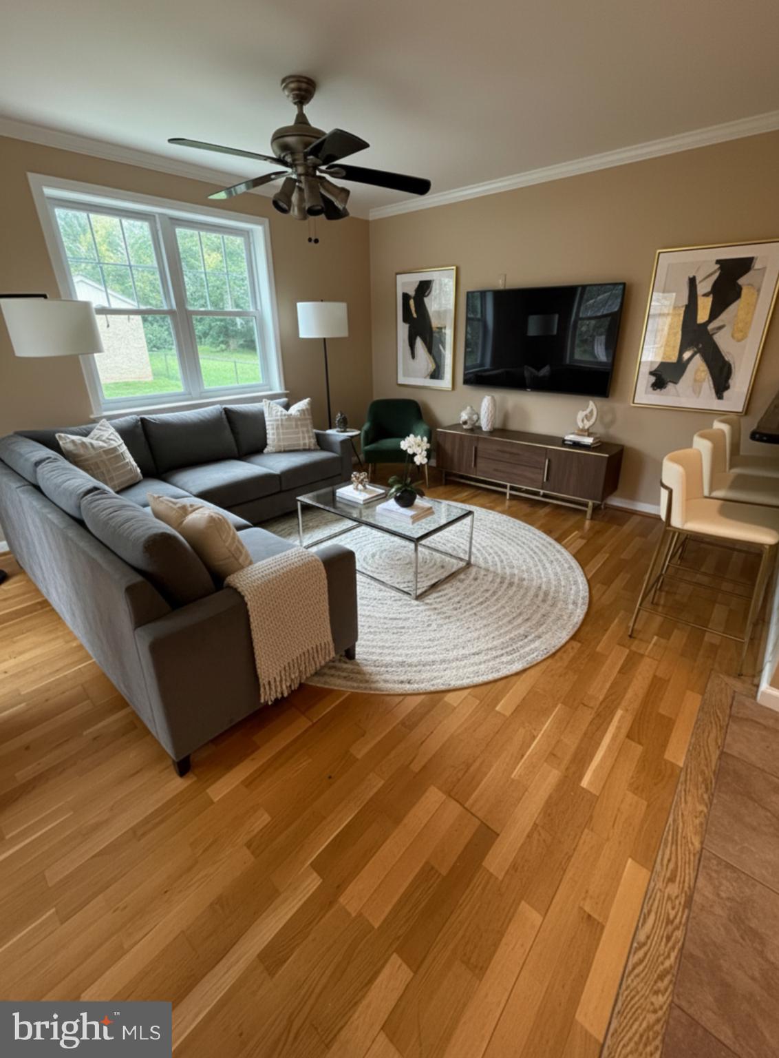 232 South Highland Road Springfield, PA 19064 - Photo 50 of 58 a living room with furniture and a flat screen tv
