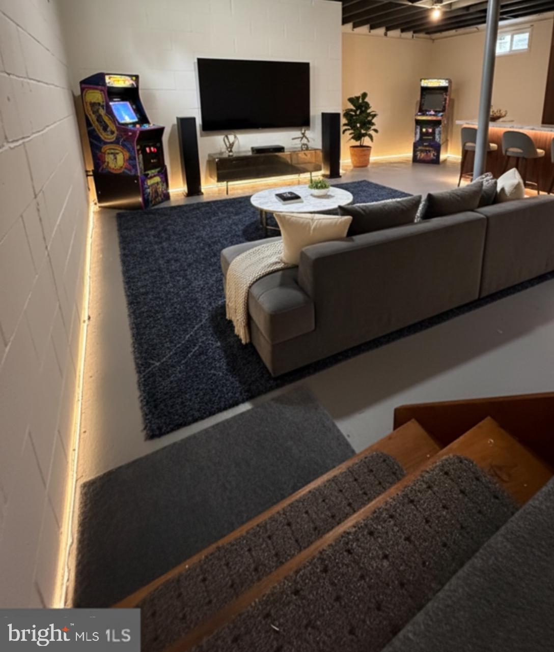 232 South Highland Road Springfield, PA 19064 - Photo 52 of 58 a living room with furniture and a flat screen tv