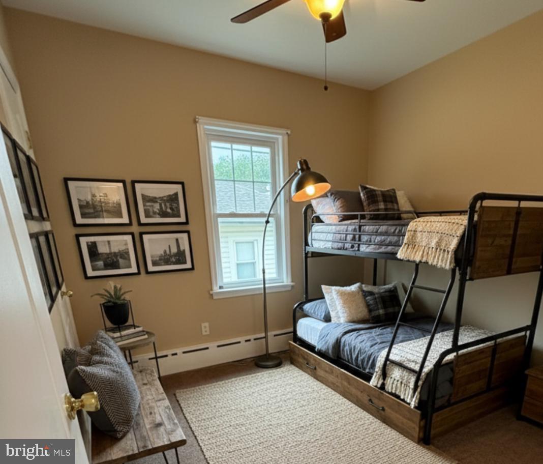 232 South Highland Road Springfield, PA 19064 - Photo 53 of 58 a bedroom with furniture and a window