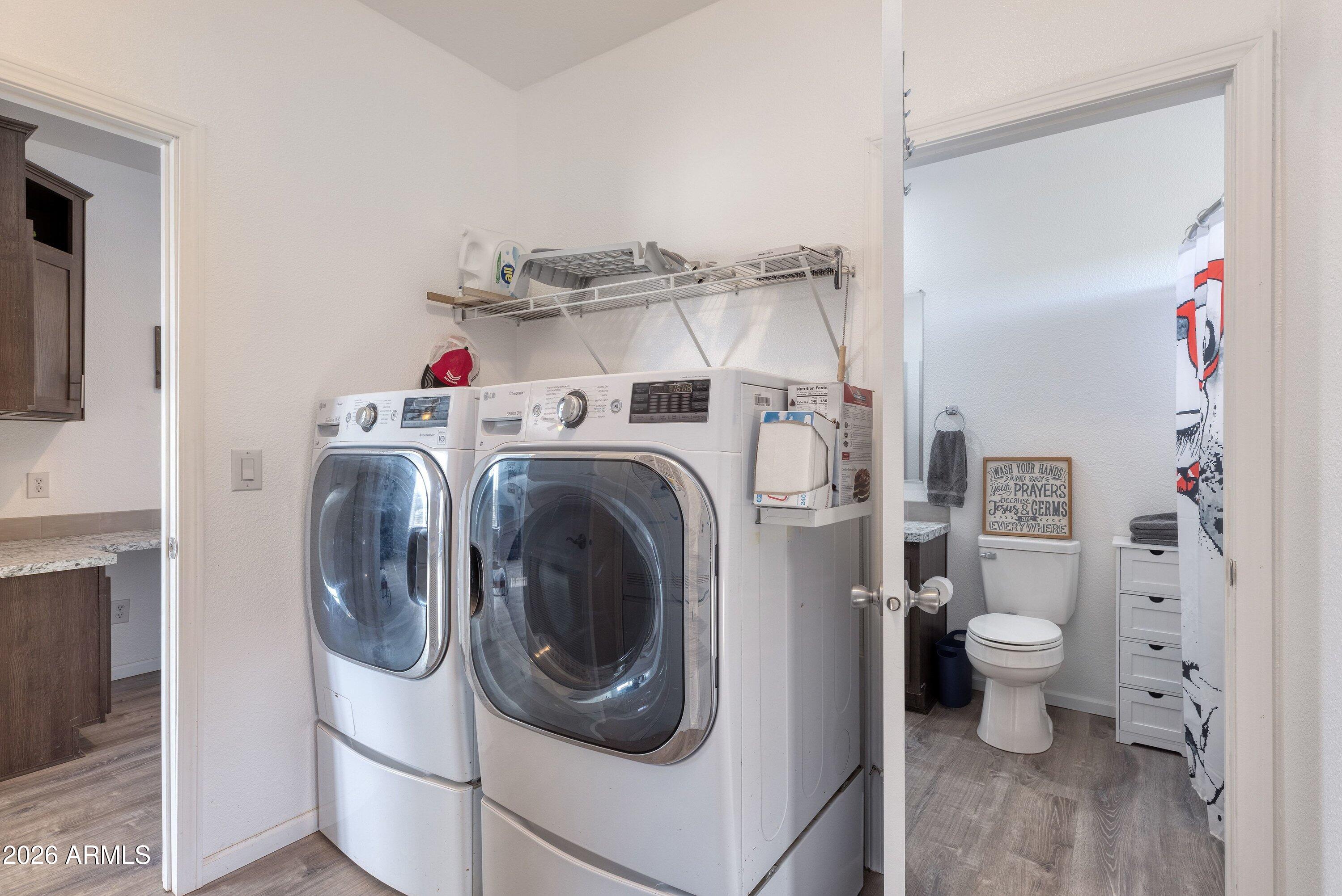 6644 Avanti Way Show Low, AZ 85901 - Photo 22 of 29 a utility room with dryer and washer