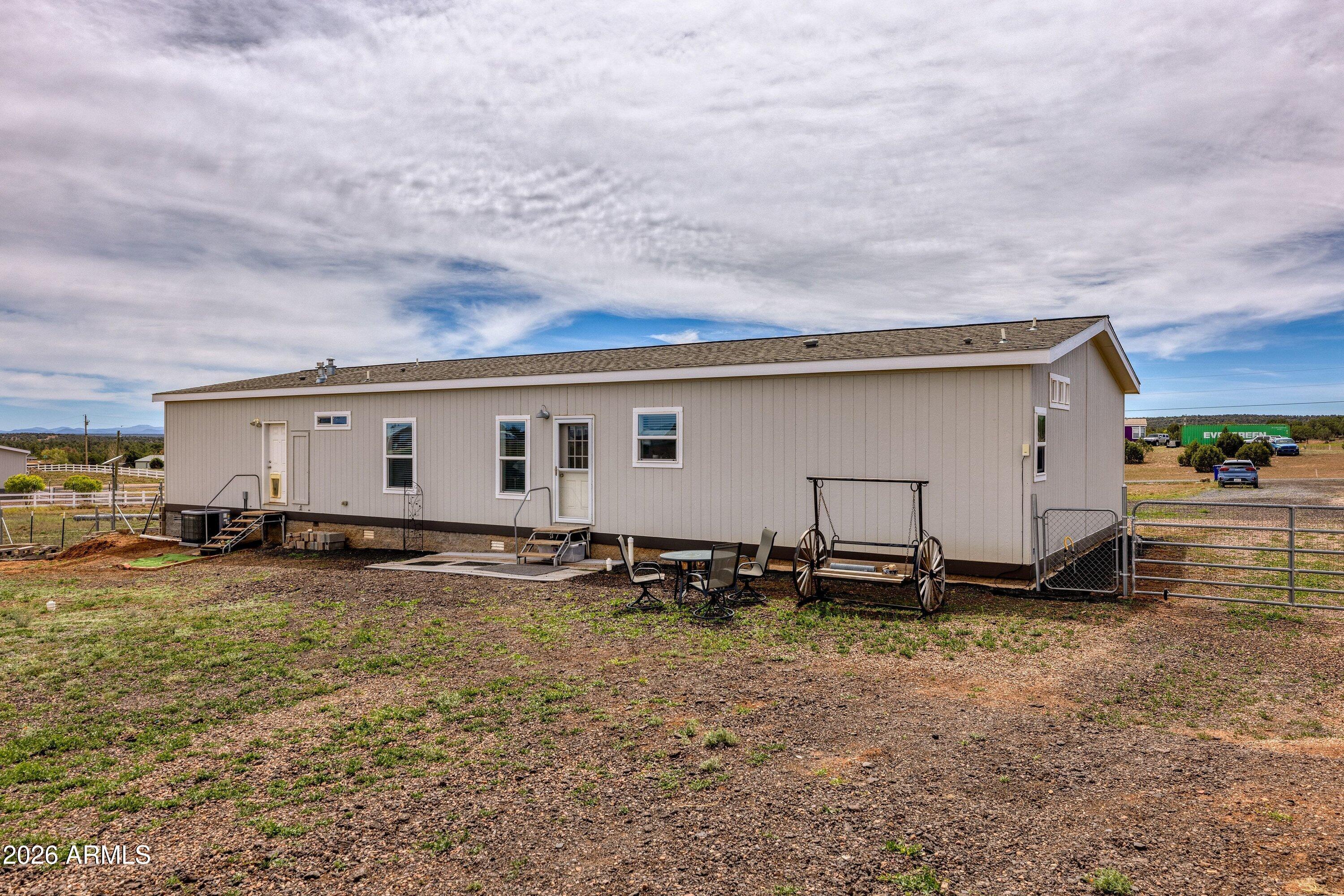 6644 Avanti Way Show Low, AZ 85901 - Photo 23 of 29 a backyard of a house