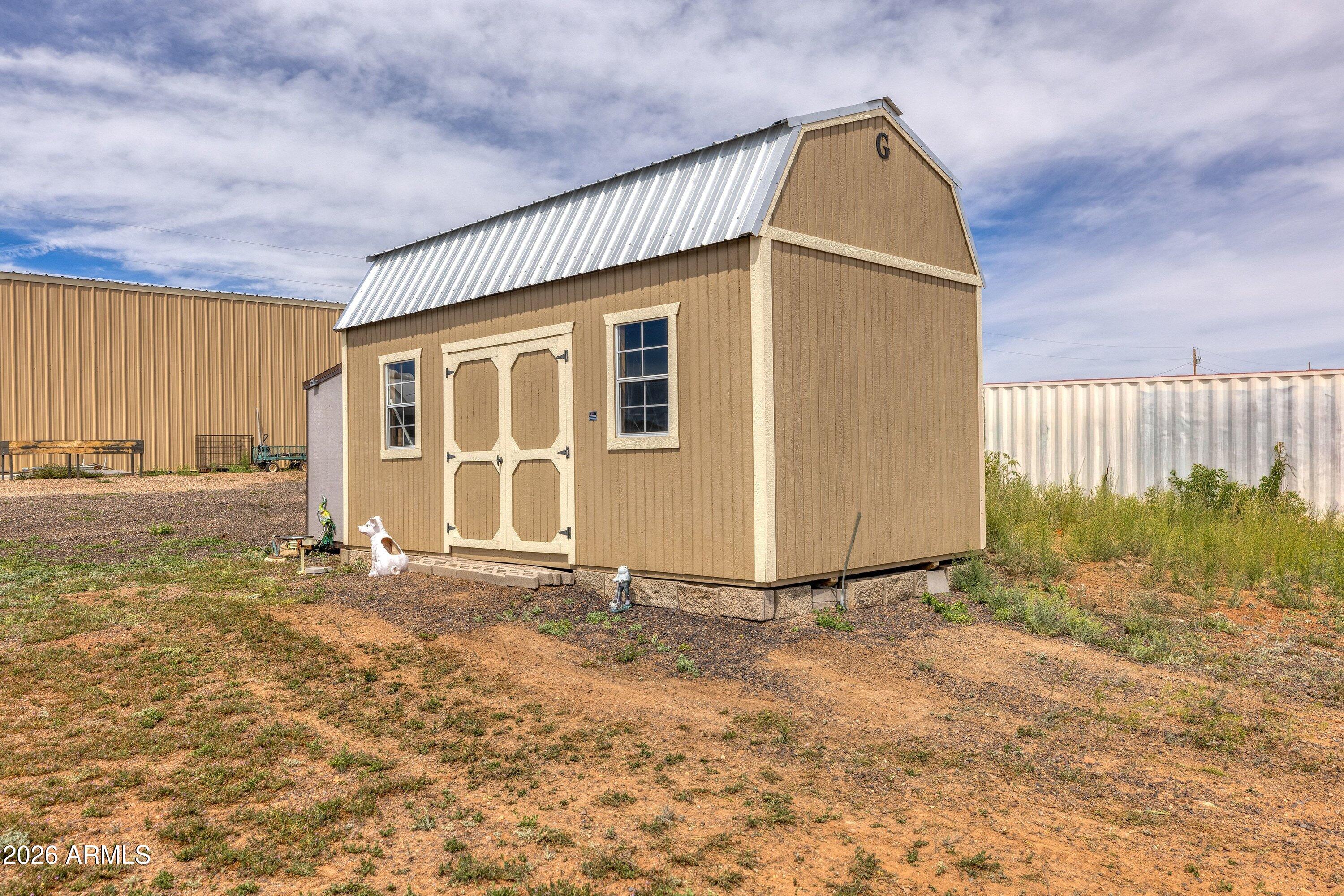 6644 Avanti Way Show Low, AZ 85901 - Photo 27 of 29 a view of a house with backyard