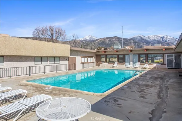 a view of a house with a swimming pool