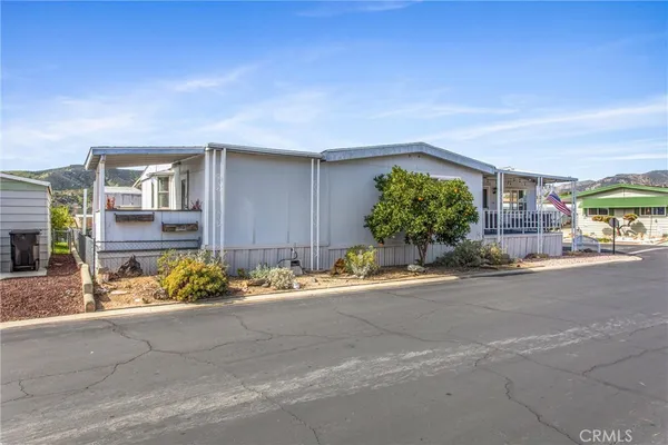 front view of a house with a street