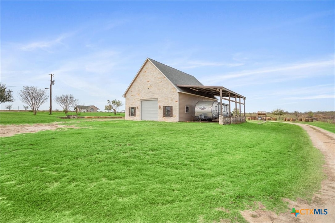 8600 Five Wells Road Rogers, TX 76569 - Photo 29 of 47 a view of a house with a big yard